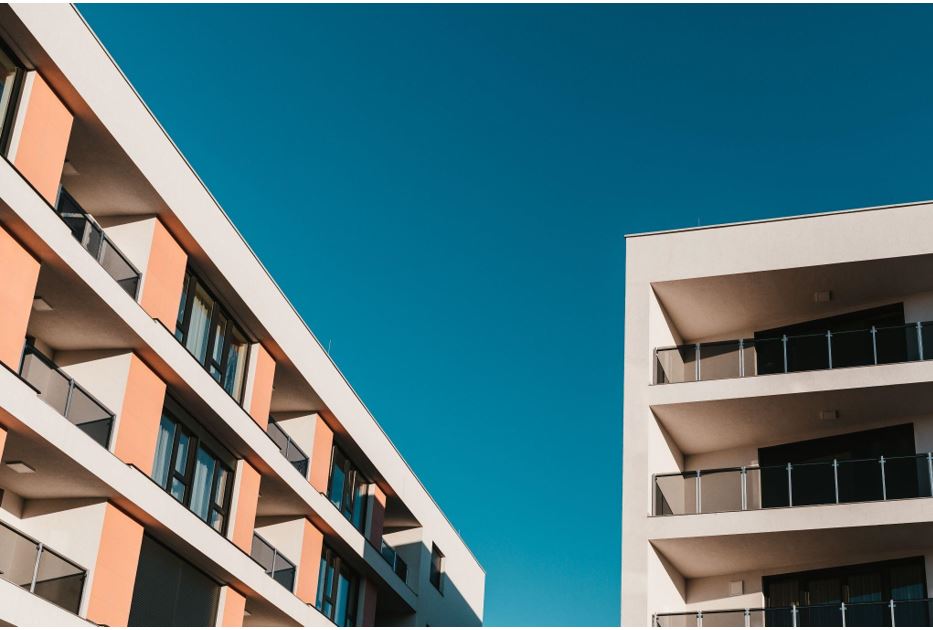 Aesthetic photo of flats and blue sky