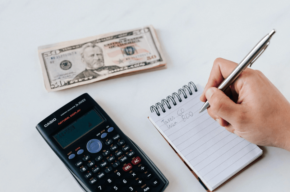 Man working out money expenses